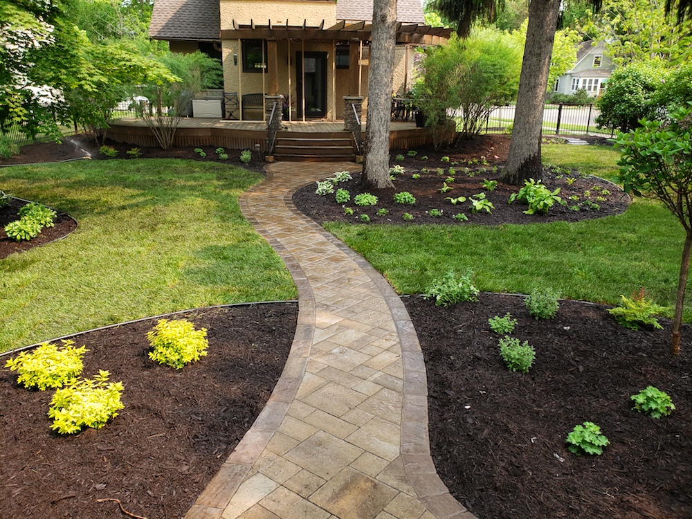 Beautiful home exterior with colorful front door and landscaping